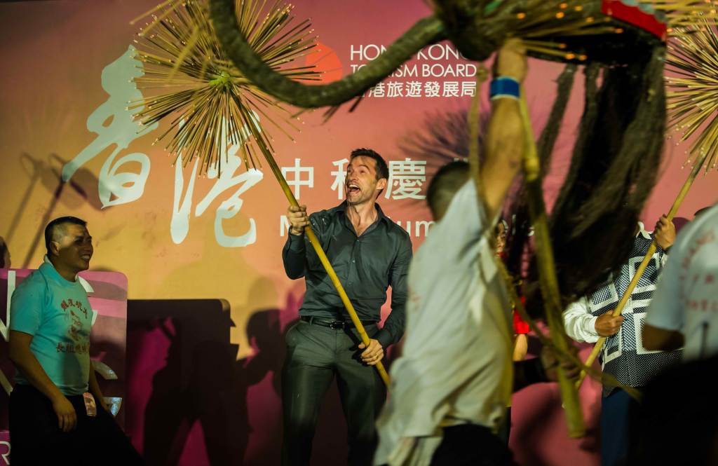 Hugh Jackman meets HK fans, joins dragon parade for ‘Pan’