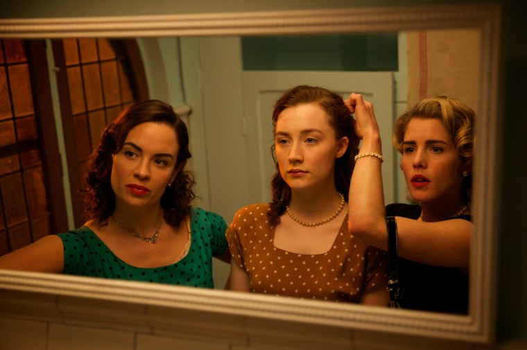 Eve Macklin as "Diana," Saoirse Ronan as "Eilis" and Emily Bett Rickards as "Patty" in BROOKLYN. Photo by Kerry Brown.  © 2015 Twentieth Century Fox Film Corporation All Rights Reserved