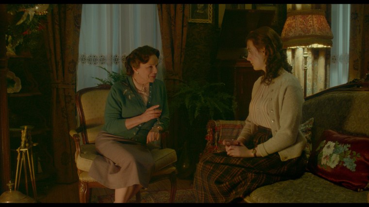 Julie Walters as "Mrs. Kehoe" and Saoirse Ronan as "Eilis" in BROOKLYN. Photo courtesy of Fox Searchlight Pictures.  © 2015 Twentieth Century Fox Film Corporation All Rights Reserved