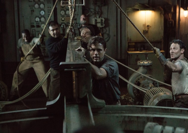 Ray Sybert (Casey Affleck) and Tchuda Southerland (Josh Stewart) struggle to keep their ship, the SS Pendleton, from sinking in Disney's THE FINEST HOURS.