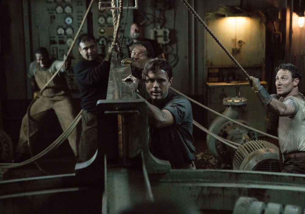 Ray Sybert (Casey Affleck) and Tchuda Southerland (Josh Stewart) struggle to keep their ship, the SS Pendleton, from sinking in Disney's THE FINEST HOURS.